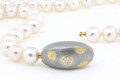 marcel roelofs clasp football shaped 18K gold stainless steel diamonds .18 mr79 2690.jpg copy 2.jpg