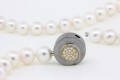 marcel roelofs clasp round .50 inch diameter stainless steel diamonds .15 carats 1975.jpg copy 1.jpg